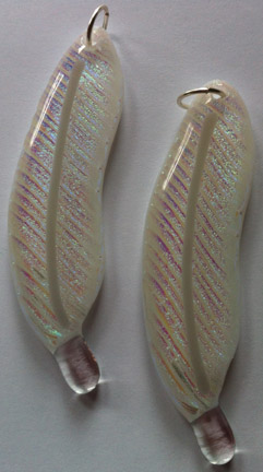 Click for a larger photo of the Clear Glass with Pink/Yellow/Green/Blue Dichroic Glass on White Glass Feather Necklace